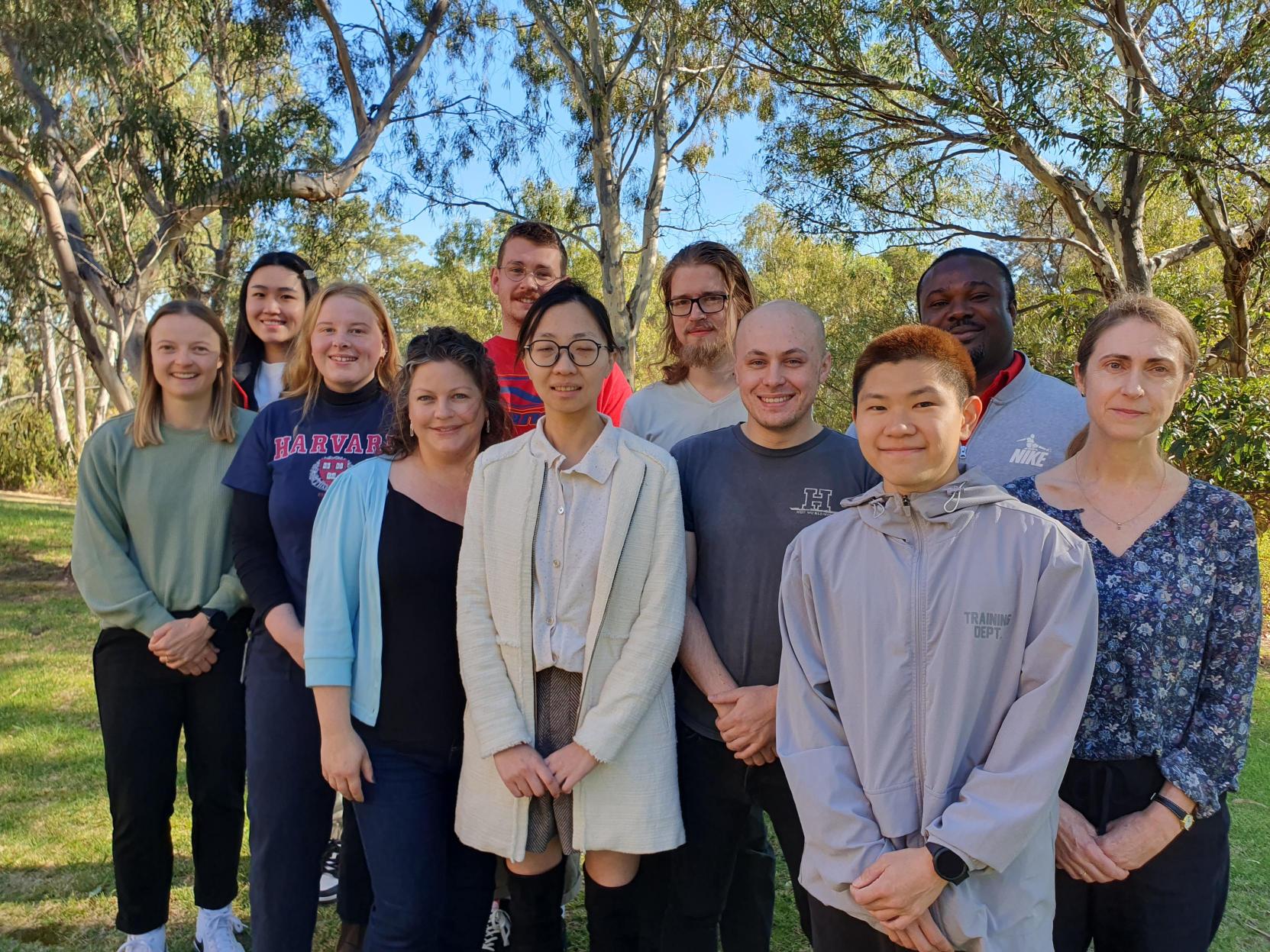 The Adelaide lab group standing together outdoors at the Waite Campus, April 2024.